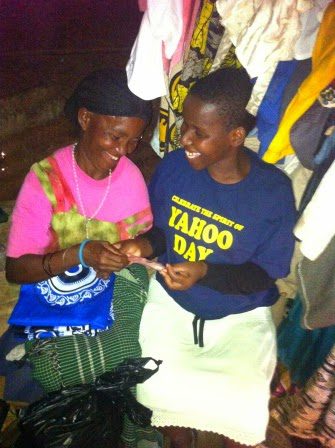 Two women, one wearing a Yahoo Day shirt.