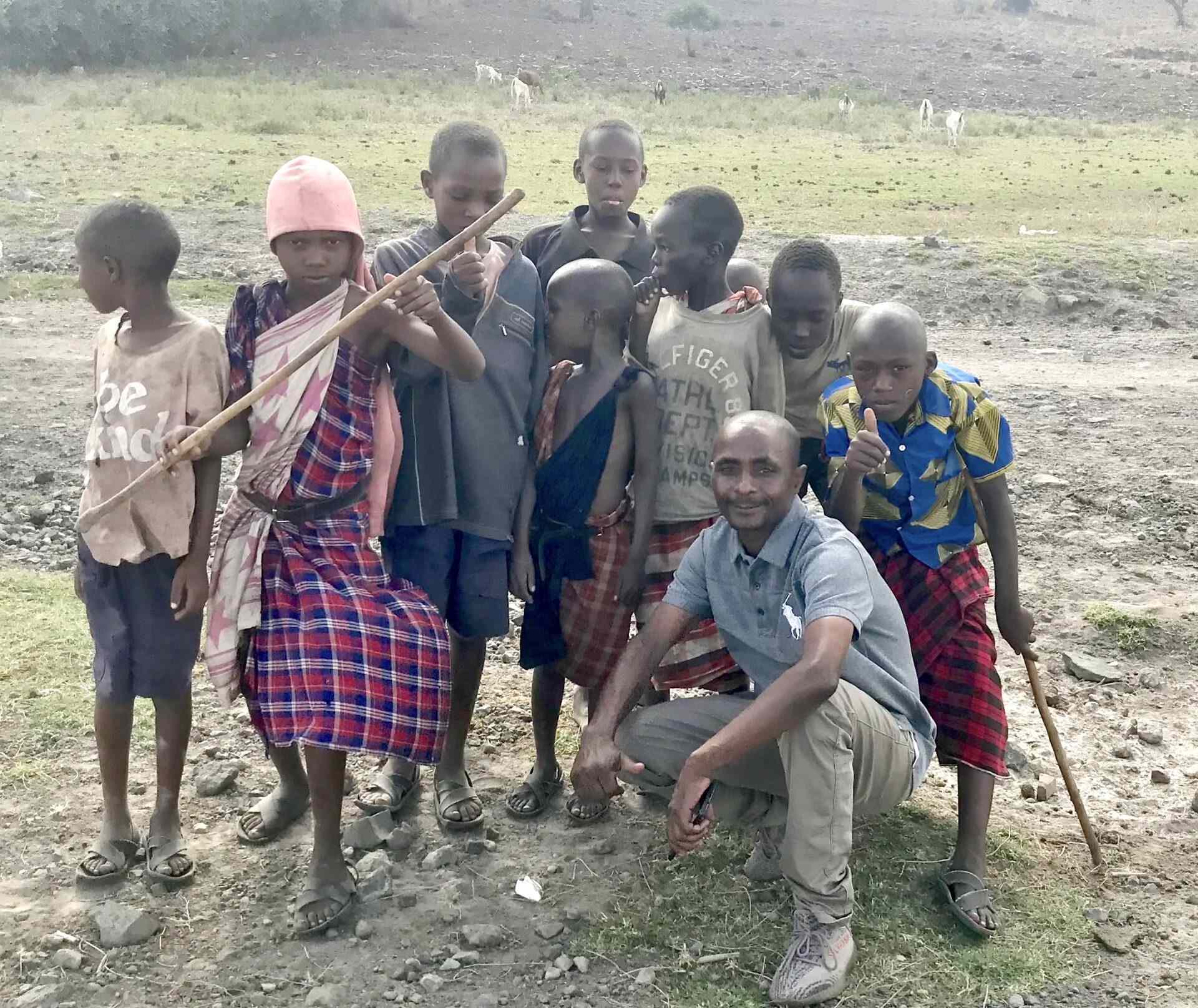 A group of children standing next to each other.