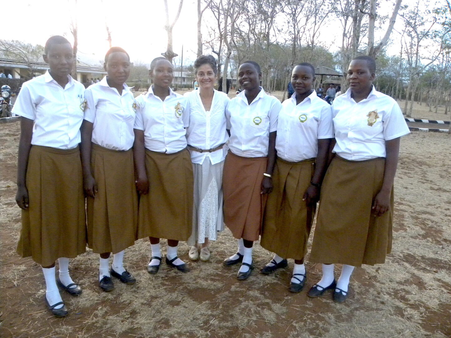 A group of women standing next to each other.