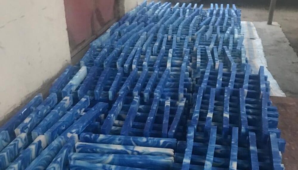Stacked blue and white patterned tiles.